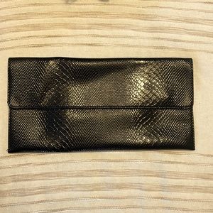 Black clutch snake skin print